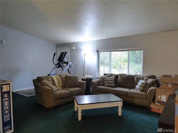 From dining area looking back toward the front door.  Tenants are in the process of packing up in preparation for their move.