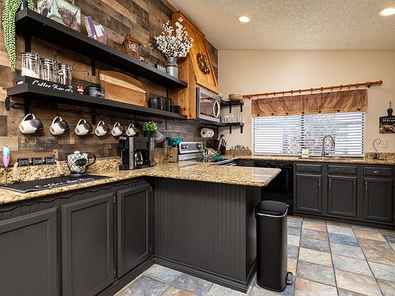 Fully stocked kitchen with coffee bar and cooking essentials