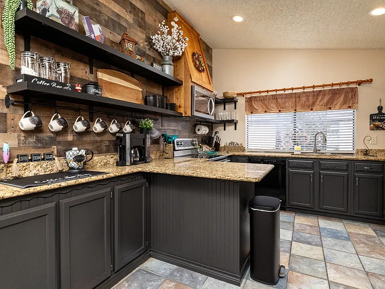 Fully stocked kitchen with coffee bar and cooking essentials