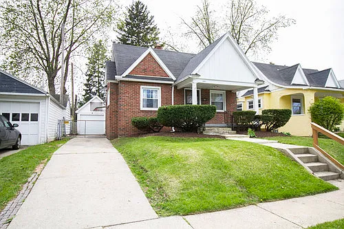 An Adorable 2BR Brick Home with Original Hardwoods, Custom Bath, Full Basement, Yard and 1 Car Ga... — Photo 1