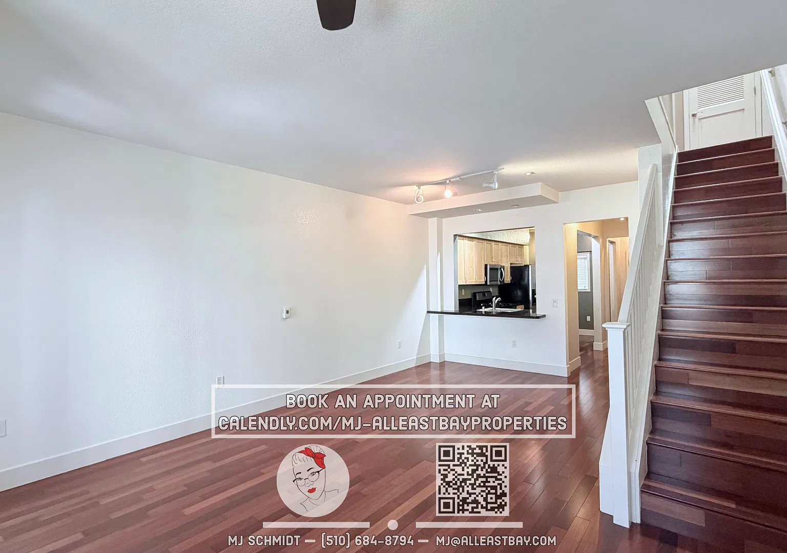 2-bed, 1.5-bath two-story condo, with rich hardwood floors, a modern kitchen, and spacious bedroo... — Photo 2