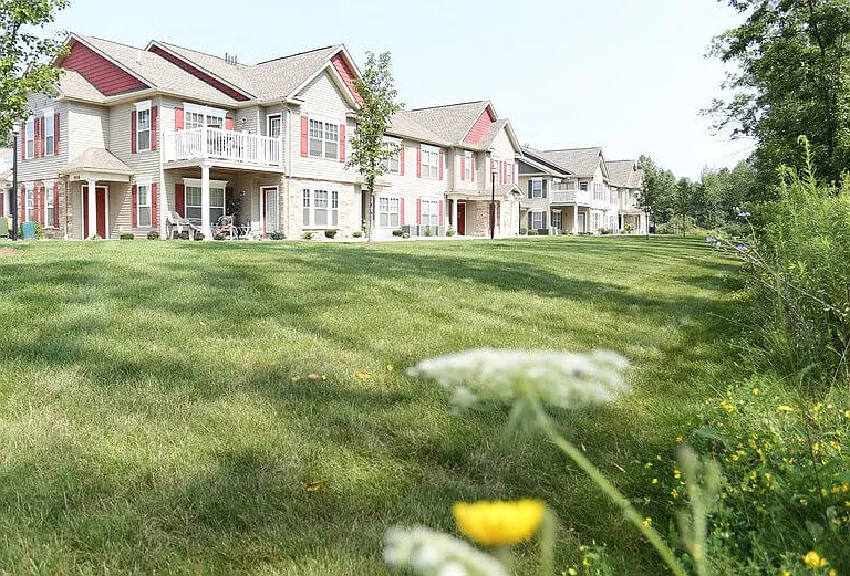 Exterior of Lehigh Park showing green areas near apartment buildings