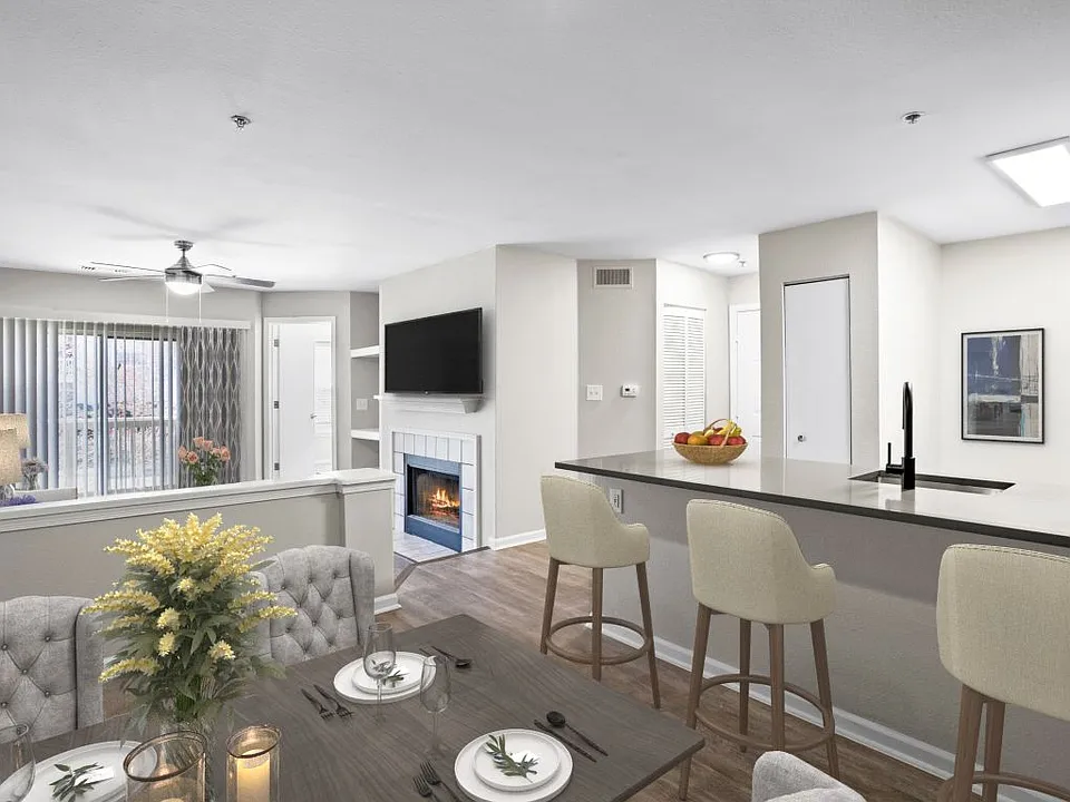 Modern kitchen with breakfast bar at The Crossings at Russett in Laurel, MD