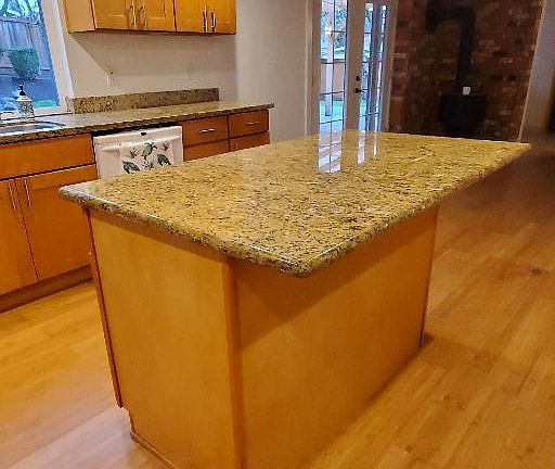 Breakfast Bar and Slab Granite Counters. Beautiful finished soffits.