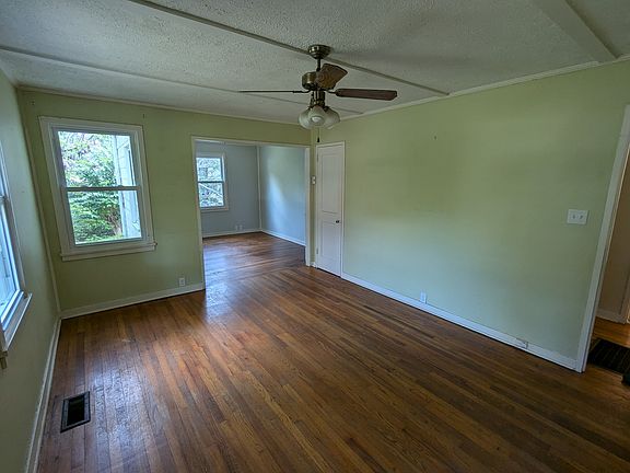 View from front door into living room and dining room/office