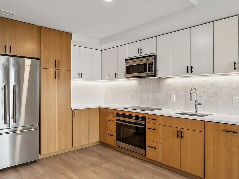 Modern kitchen with stainless steel appliances