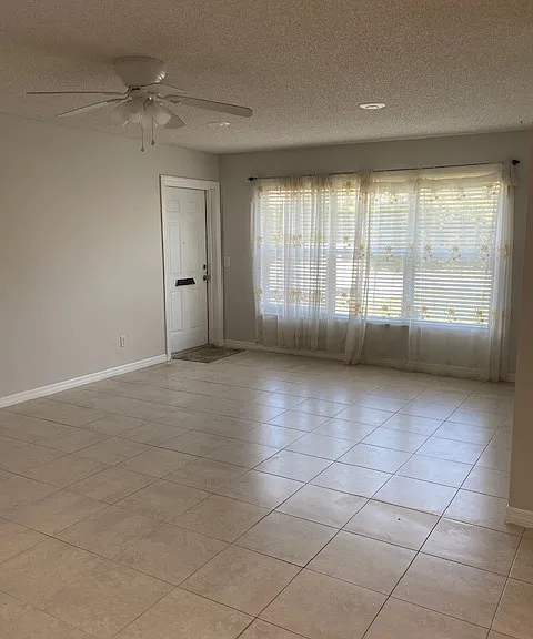 Front door leading into extra formal living space.