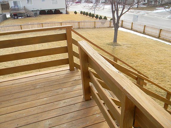 Balcony and large fenced back yard