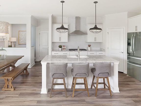 Kitchen Island with barstools for additional seating.