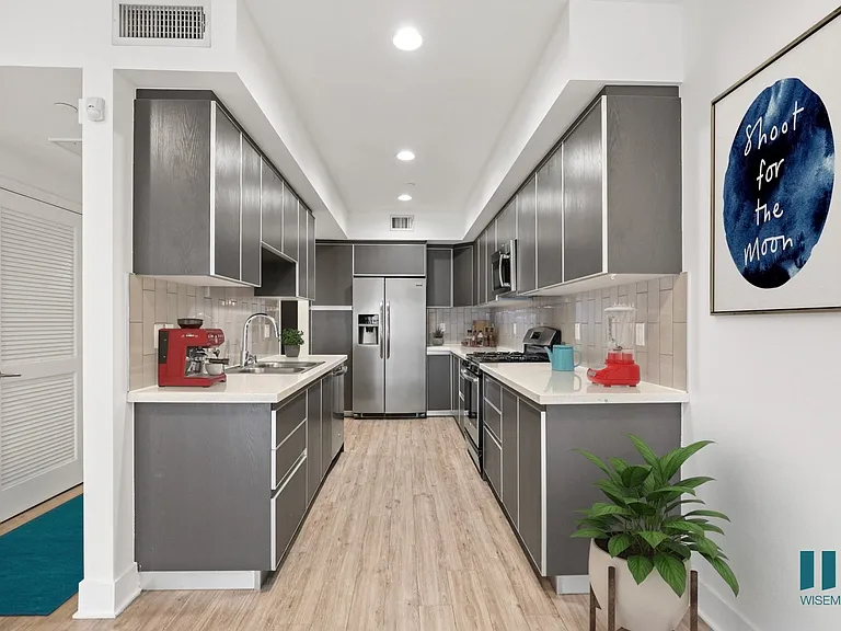 Full-Size Kitchen with Energy-Effcient Appliances and Ample Cabinet Storage