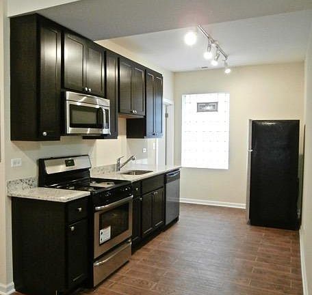 4th image of 4747-51 Troy Street Gdn