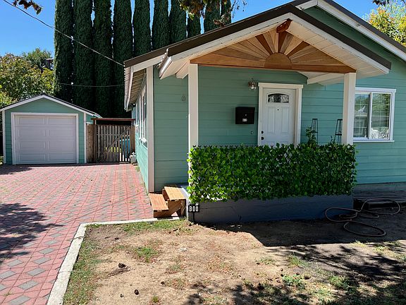 Paver driveway with room for 2-3 cars.