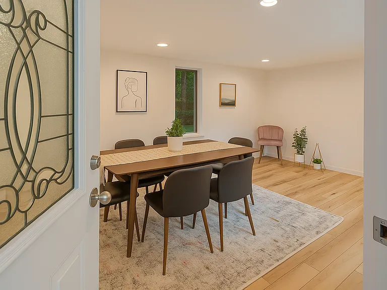 Step into a stylish dining space that feels both modern and serene.