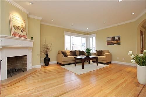 Beautiful living room with wood-burning fireplace