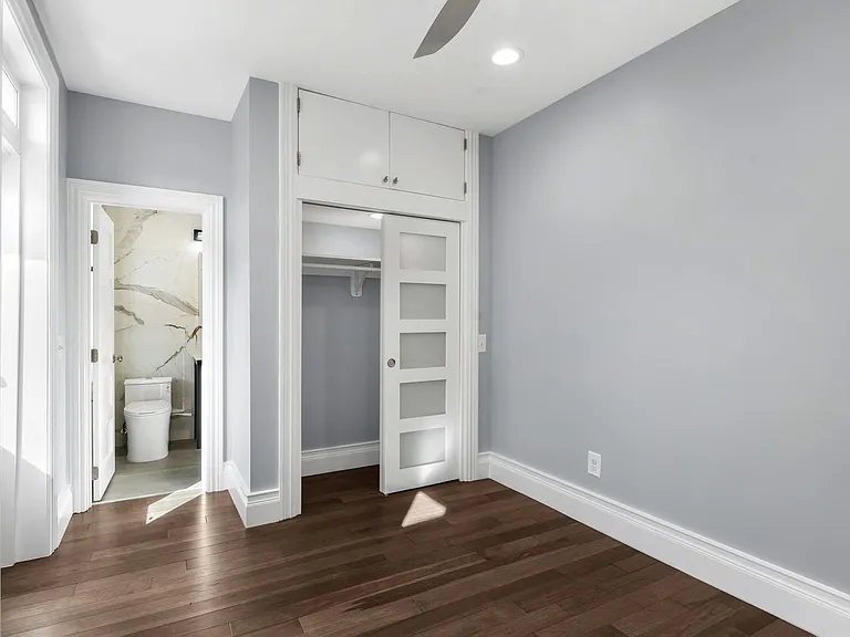 2nd master bedroom with direct bathroom access, closet with storage above and private access to the second roofed deck
