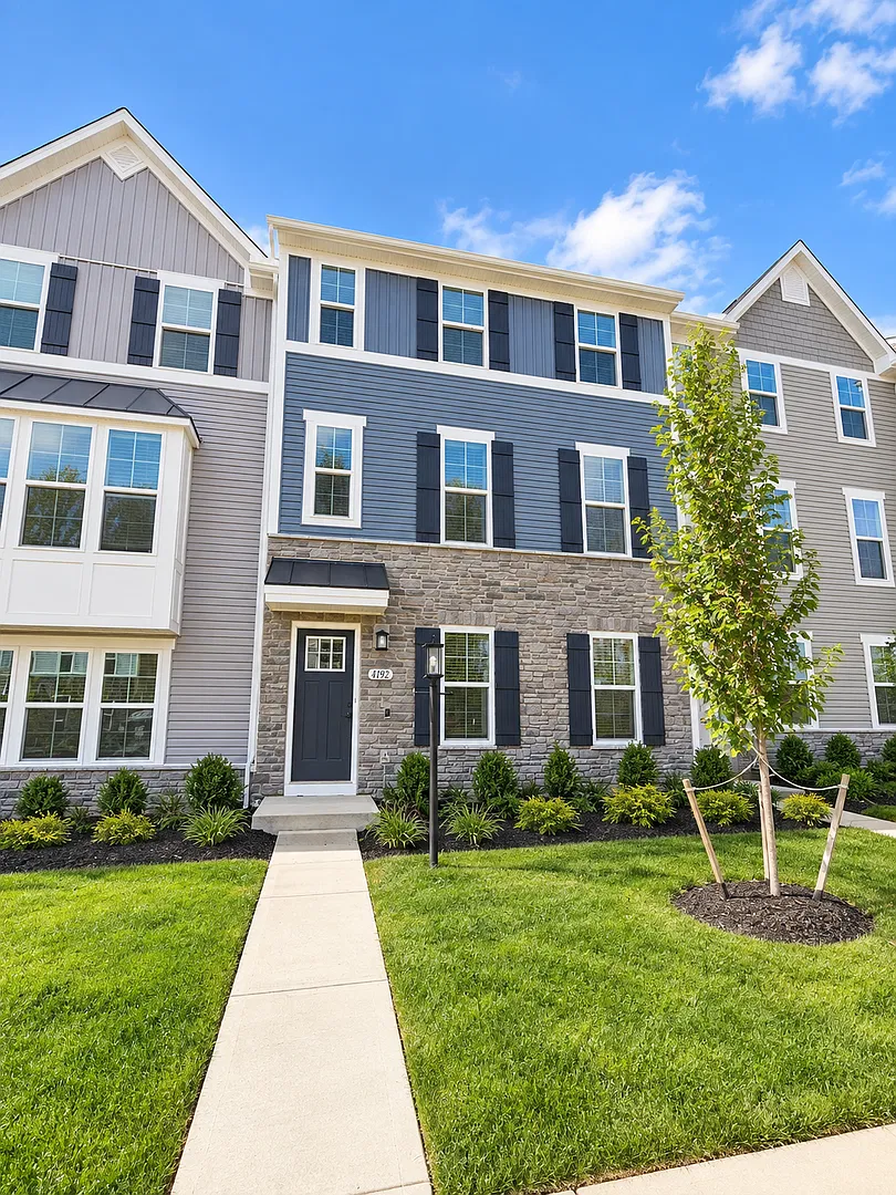 Exclusive New Construction Townhome | Private Oasis with Premier Amenities — Photo 1