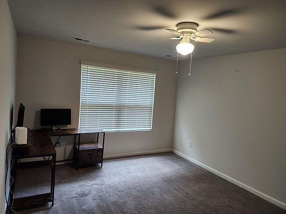 Master bedroom with desk