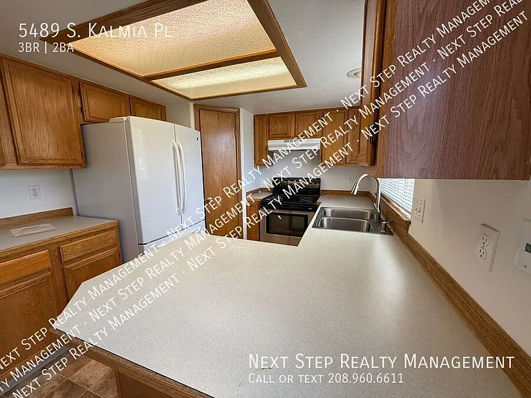 5489 S Kalmia Pl — Photo 5