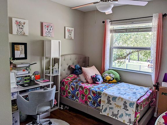 2nd bedroom with view to the park and walking closet.
