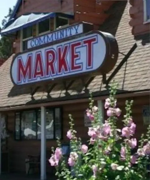 Community market with warm deli food is right at the bottom of the street :o)