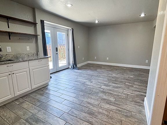 Kitchen looking into living room, entrance