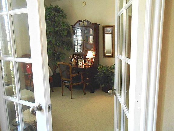 A separate study with glass panel French doors or can be a fourth bedroom.