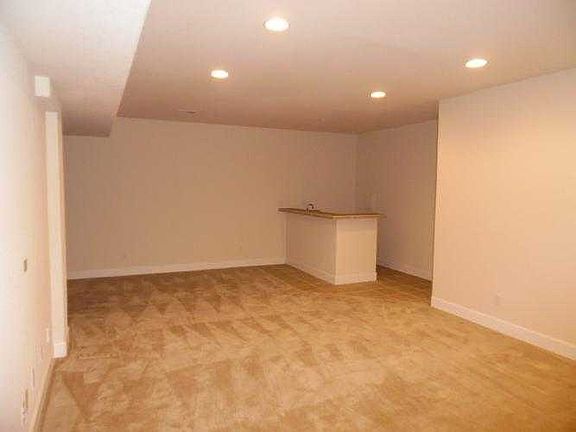BASEMENT VIEW FAMILY ROOM WITH BAR AREA