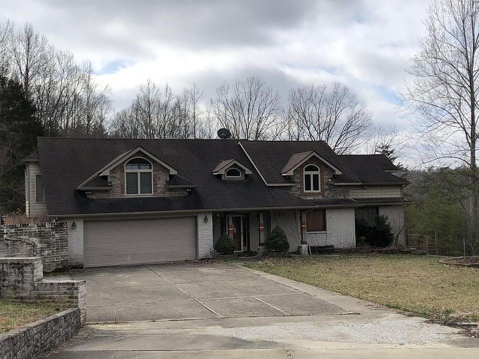 Private drive into property.  Windowed gables for plenty of light  