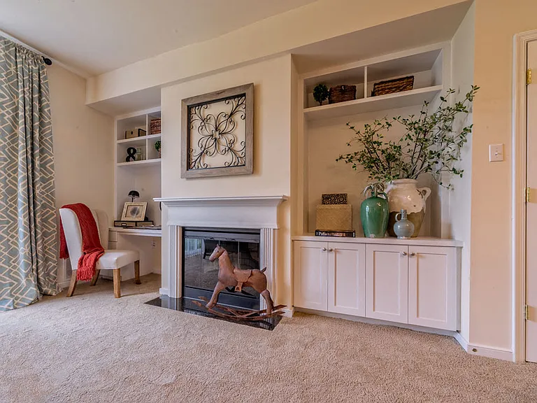 Some homes include fireplaces and built-in cabinets