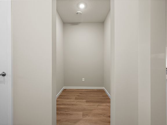 There is a flex room off the foyer.