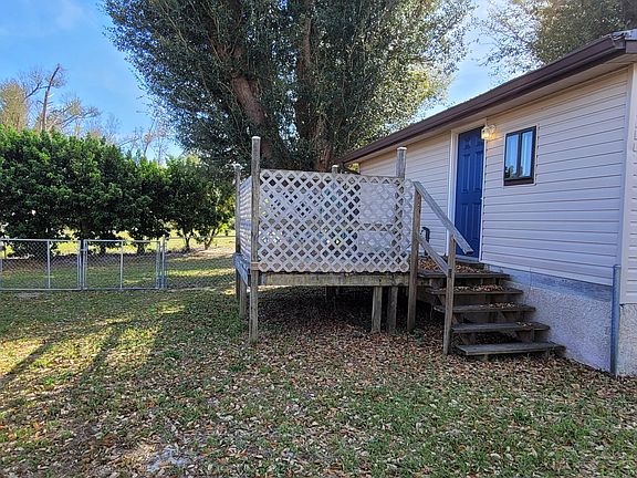 Back of the rental with porch/deck