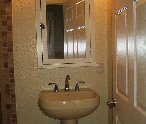 2nd Bath With Large Walk-in Shower And Modern Fix.