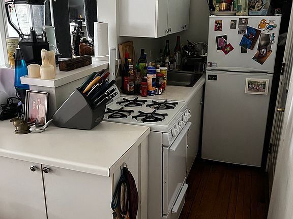 kitchen (back door to the right of fridge)