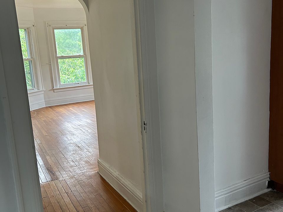 Kitchen through door on right, living room through door on left.