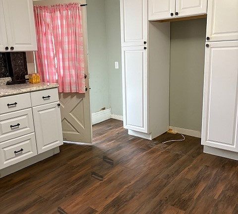 Kitchen with Side Door. Brand New s/s Refrigerator has since 
been installed.