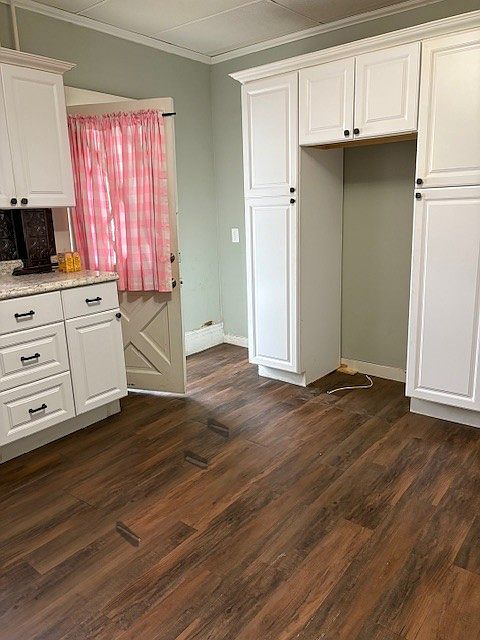 Kitchen with Side Door. Brand New s/s Refrigerator has since 
been installed.