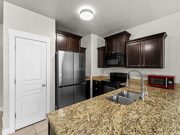 4th image of 1621 N Venetian Way E