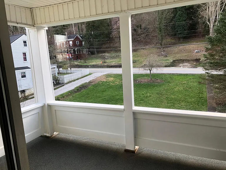 Front 2nd floor porch looking out on yard and Marshall St.