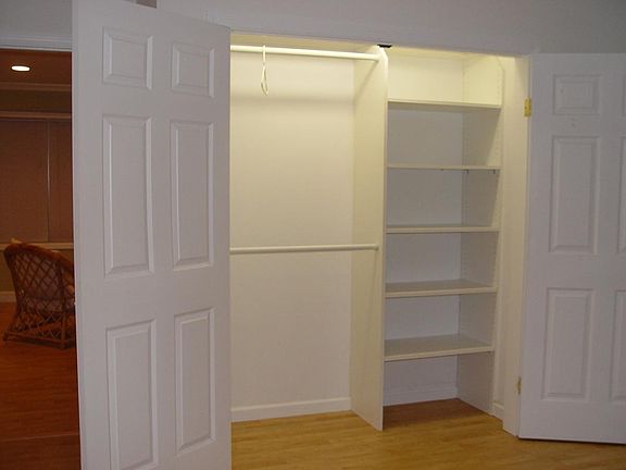 closet multiple shelves and poles