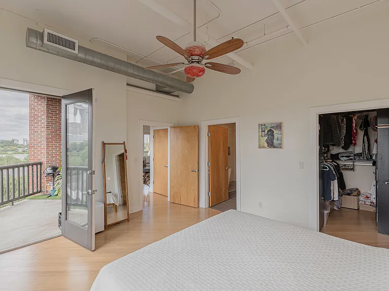 Master bedroom with ensuite bathroom and walk-in closet