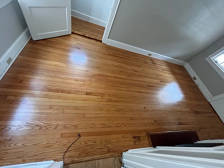 Living room floor sanded and refinished July 2024