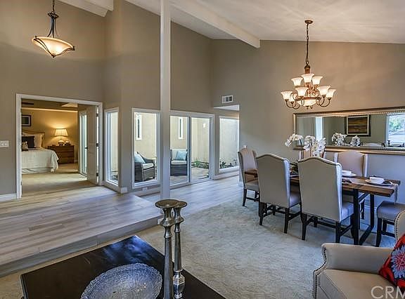 Formal dining area with views to main floor master suite and private atrium