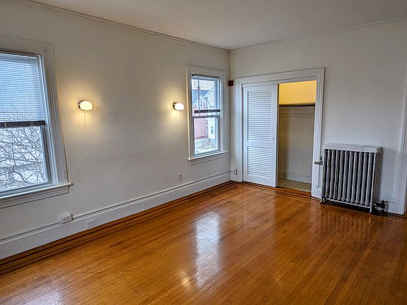 Living room with closet.