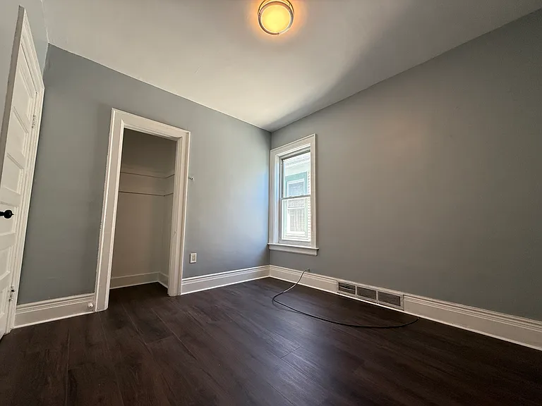 Bedroom 2 with 1 closet and 1 window