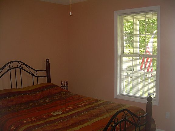 Bedroom 3 looking out to full front porch.