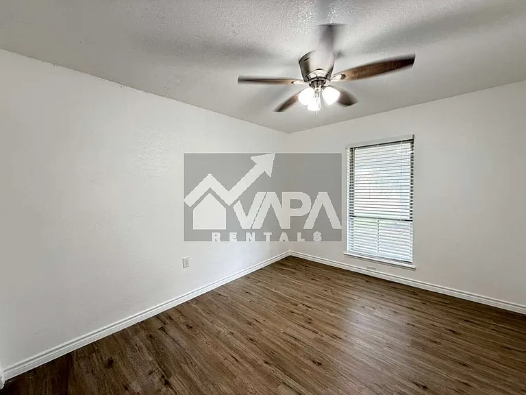 7729 Narrow Pass Dr — Photo 9