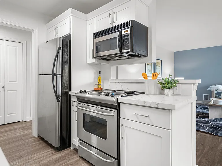 Kitchen bar area has room for seating
