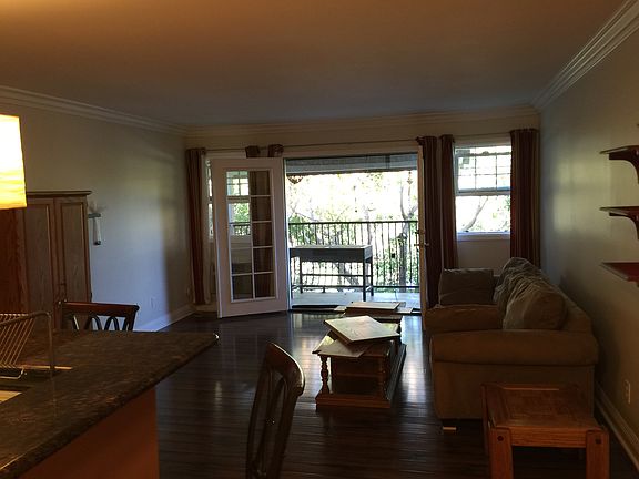 living room with crown moldings