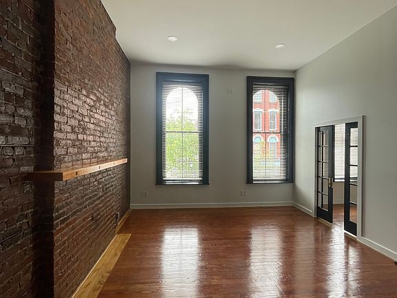 Open living room with mantle