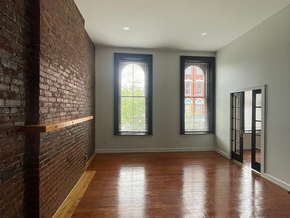 Open living room with mantle
